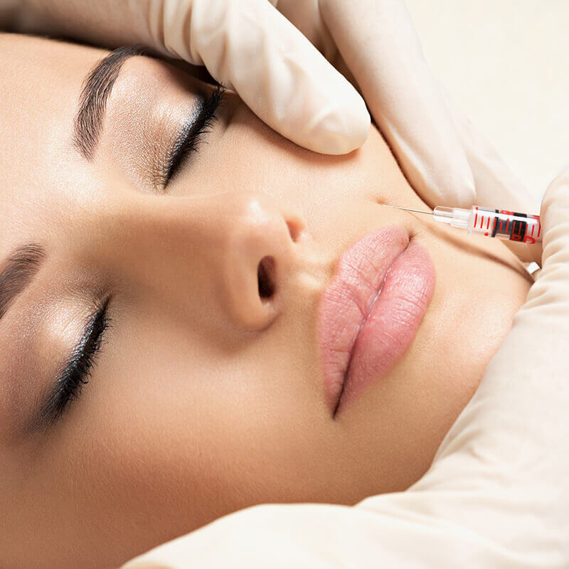 Woman Getting Lip Injections