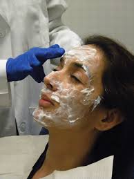 Topical numbing cream application before aesthetic treatment at Mountcastle Medical Spa in Ashburn VA